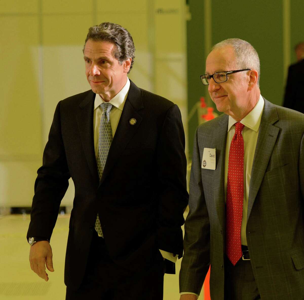 Governor Andrew Cuomo, left, is joined by Cornell president David Skorton as he continues his speaking engagements for his Tax-Free intitiative June 3, 2013, at the College of Nanoscale Science and Engineering in Albany, N.Y. (Skip Dickstein/Times Union)