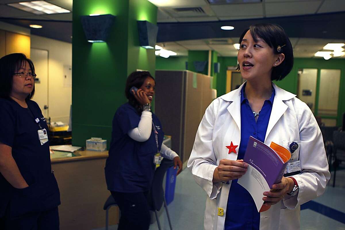 Medical director of the pediatric emergency department Christine Cho, M.D. (right) shows the lobby area of the new pediatric emergency department at UCSF Benioff Children's Hospital in San Francisco, Calif., on Thursday, May 30, 2013.