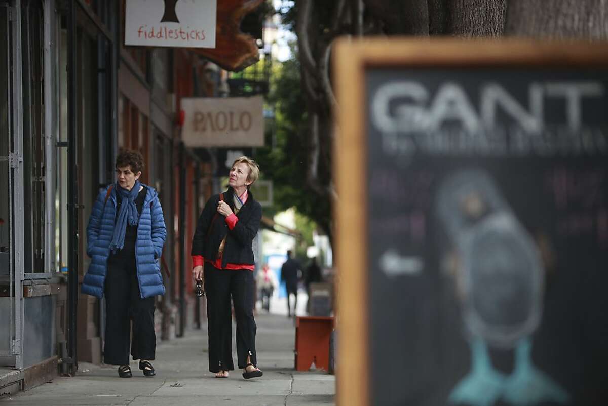 Ruth Finkelstein (l to r) of San Francisco and Eva Incaudo of Sacramento look in shop windows as they walk on Hayes Street on Tuesday, June 4, 2013 in San Francisco, Calif.