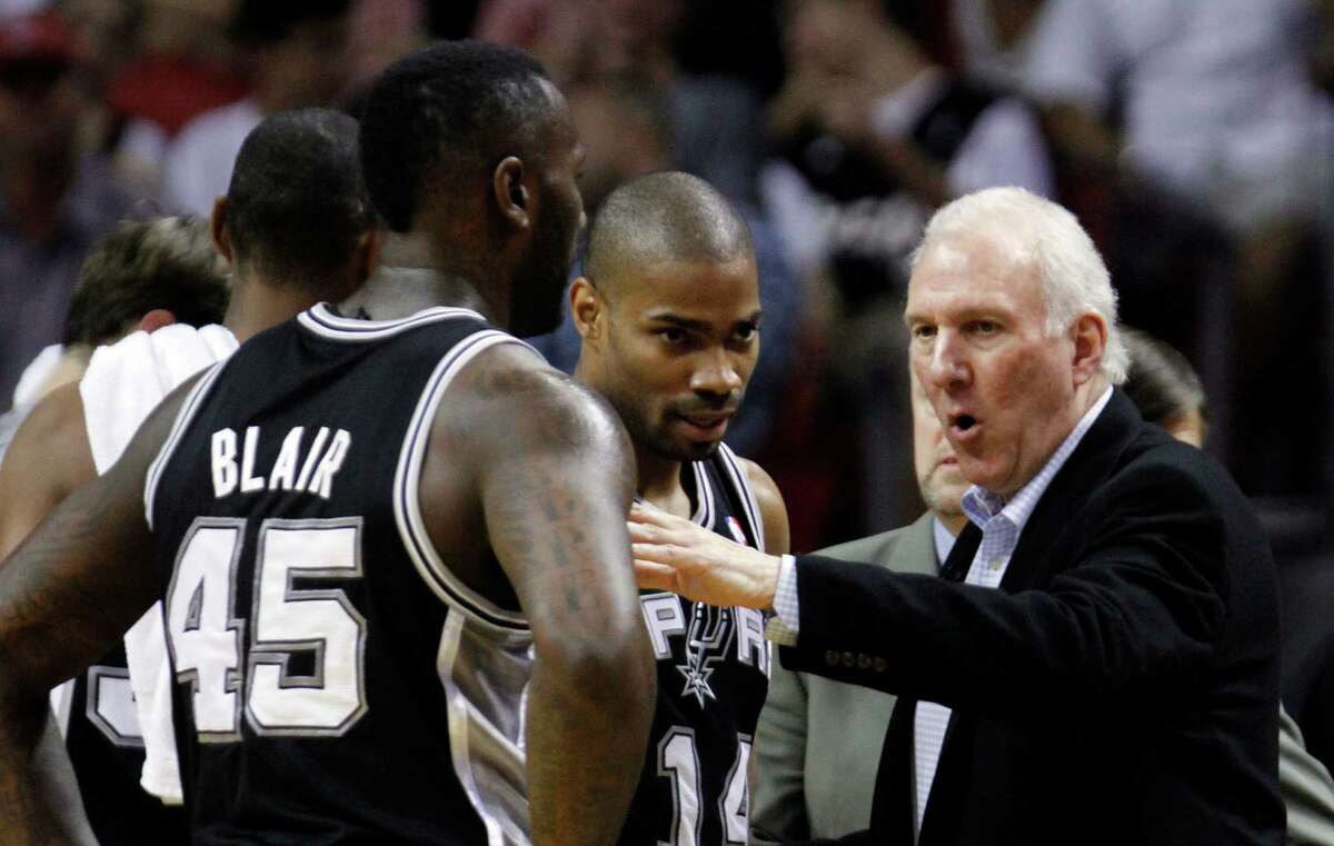 Spurs coach Gregg Popovich instructs DeJuan Blair (45) and Gary Neal in what turned out be a close loss at Miami on Nov. 29 even though Popovich had given Tim Duncan, Tony Parker, Manu Ginobili and Danny Green the night off.