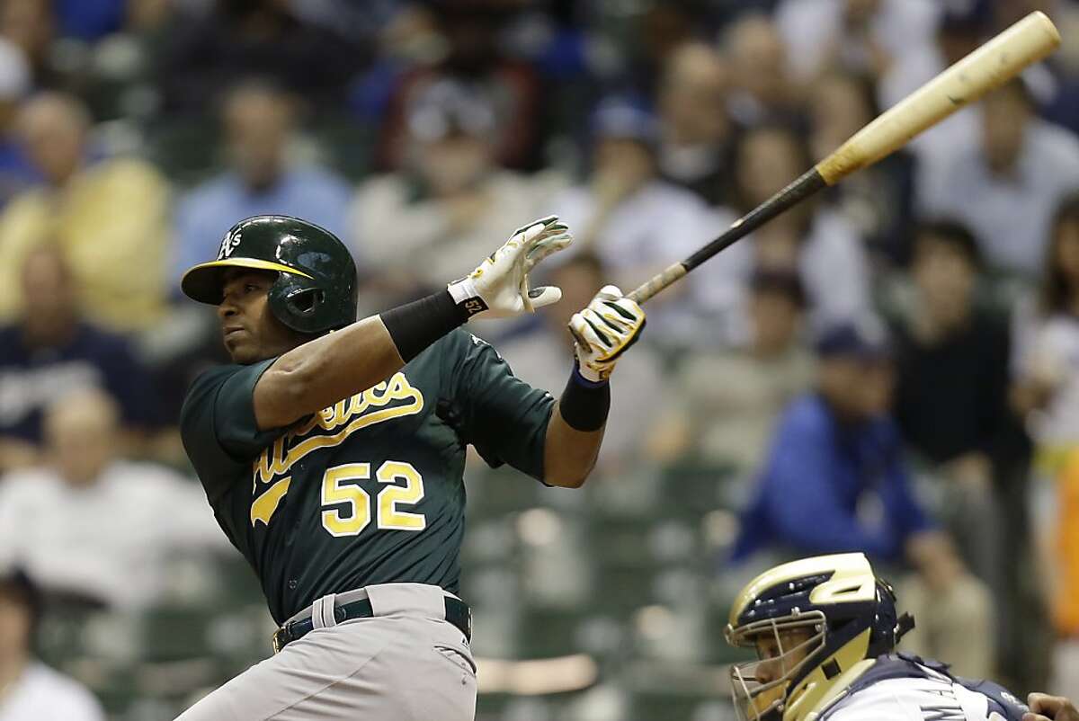 Brewers overtake A's, win in 10th