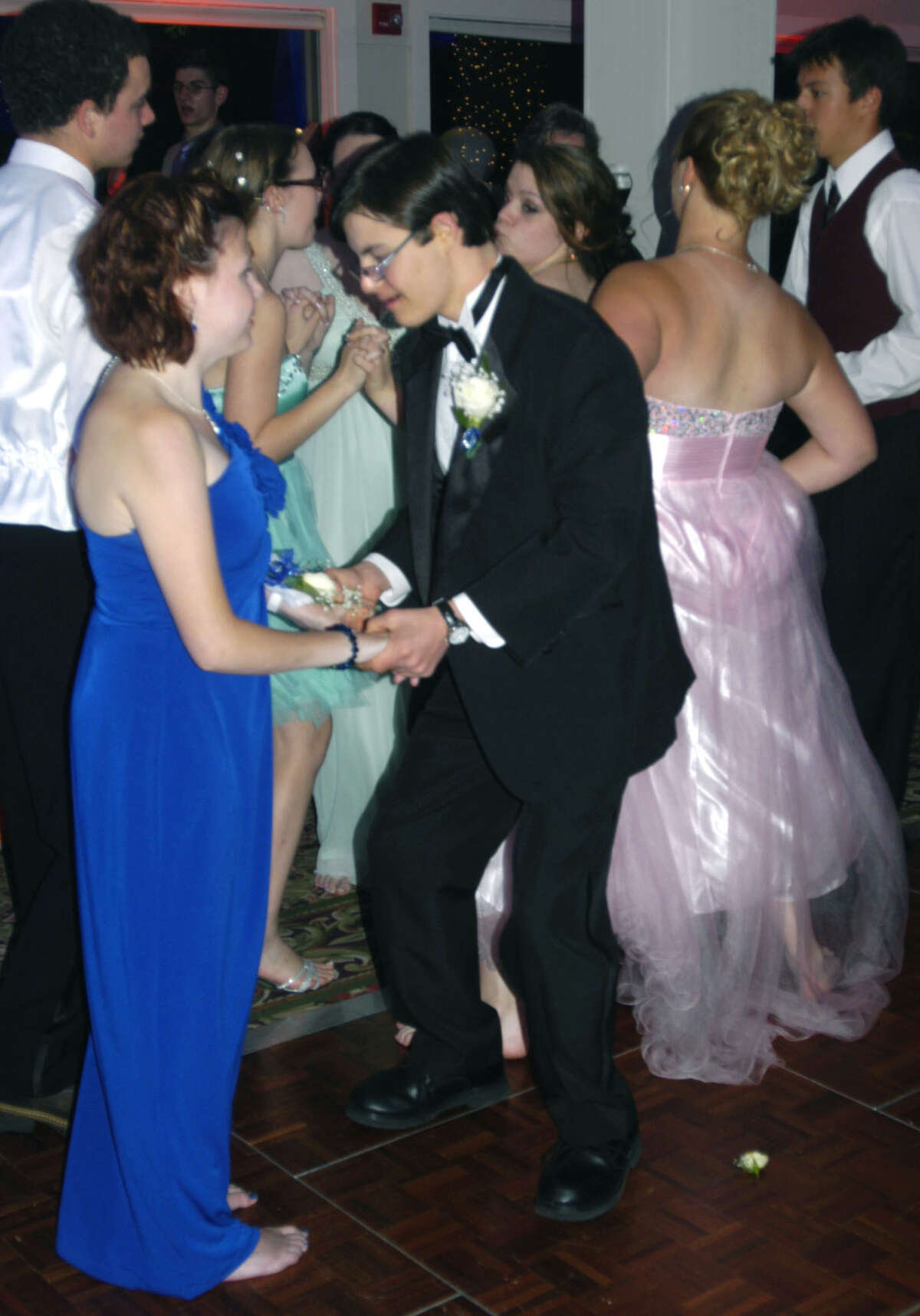 Justin Isaac and his date, Cheyenne Daugherty, enjoy a dance during the Shepaug Valley High School prom, May 25, 2013 at the Heritage Inn in Southbury.