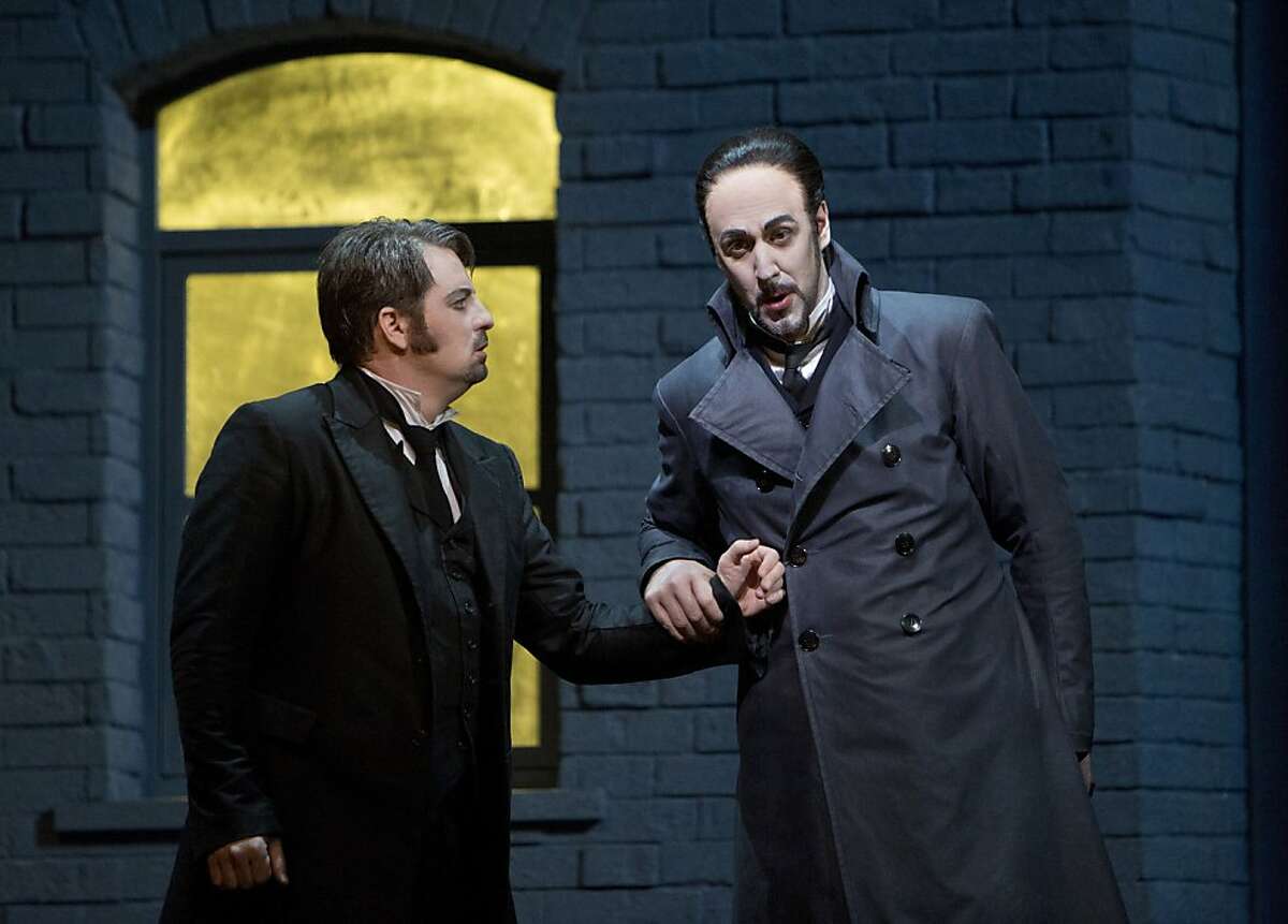 Matthew Polenzani (l.) as Hoffmann and Christian Van Horn as Lindorf in Offenbach's "Tales of Hoffmann" at SF Opera