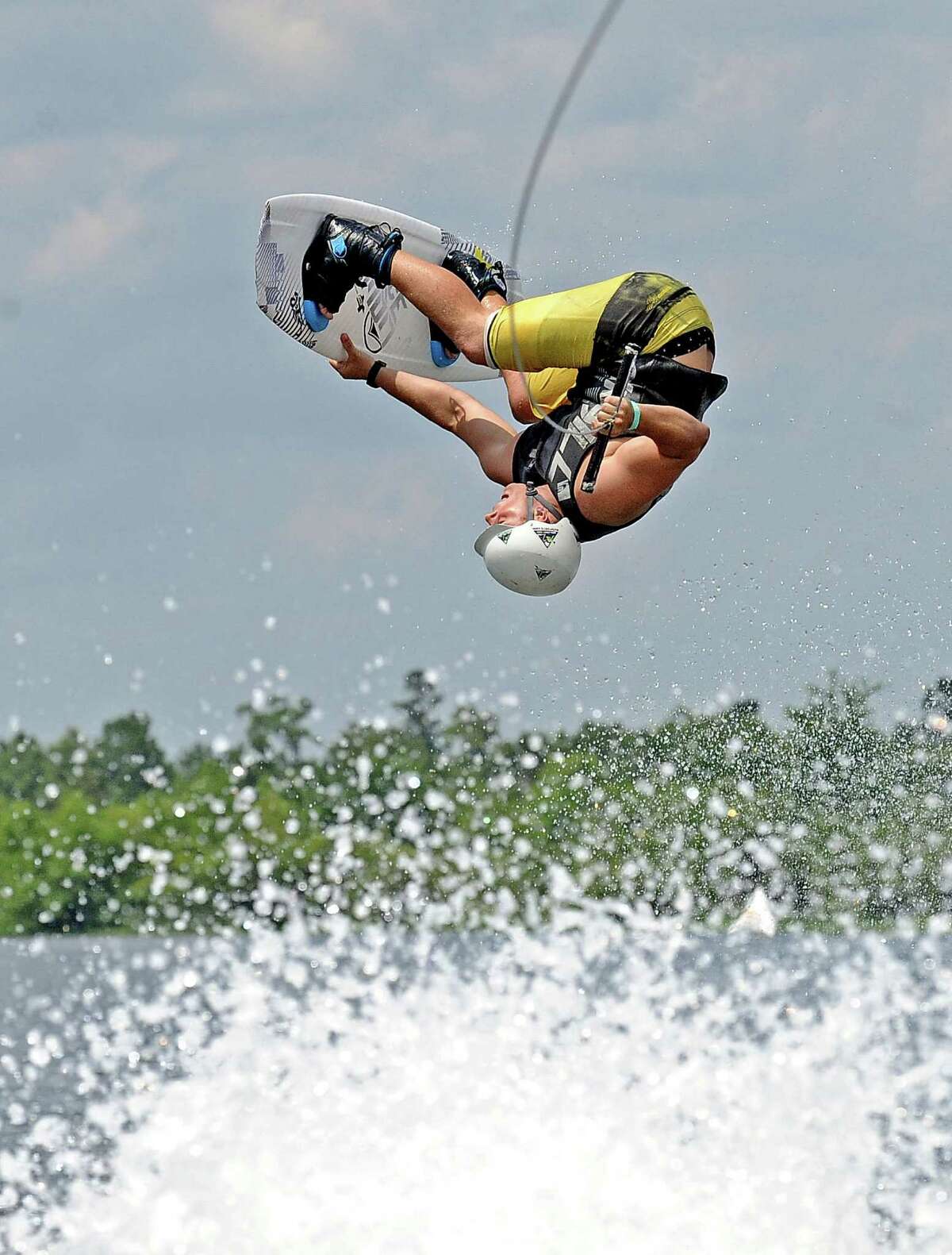 Elliott Dollar competes in the SETx Mid Summer Classic wake boarding event in Rose City on Saturday, June 8, 2013. Photo taken: Randy Edwards/The Enterprise
