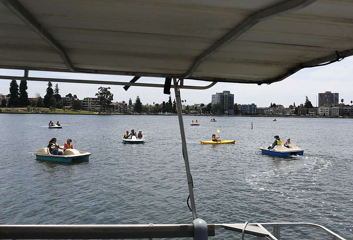 Boaters enjoy the lake during the Love Our Lake Day celebrations of renovations to Lake Merritt in Oakland, Calif. on June 9, 2013.
