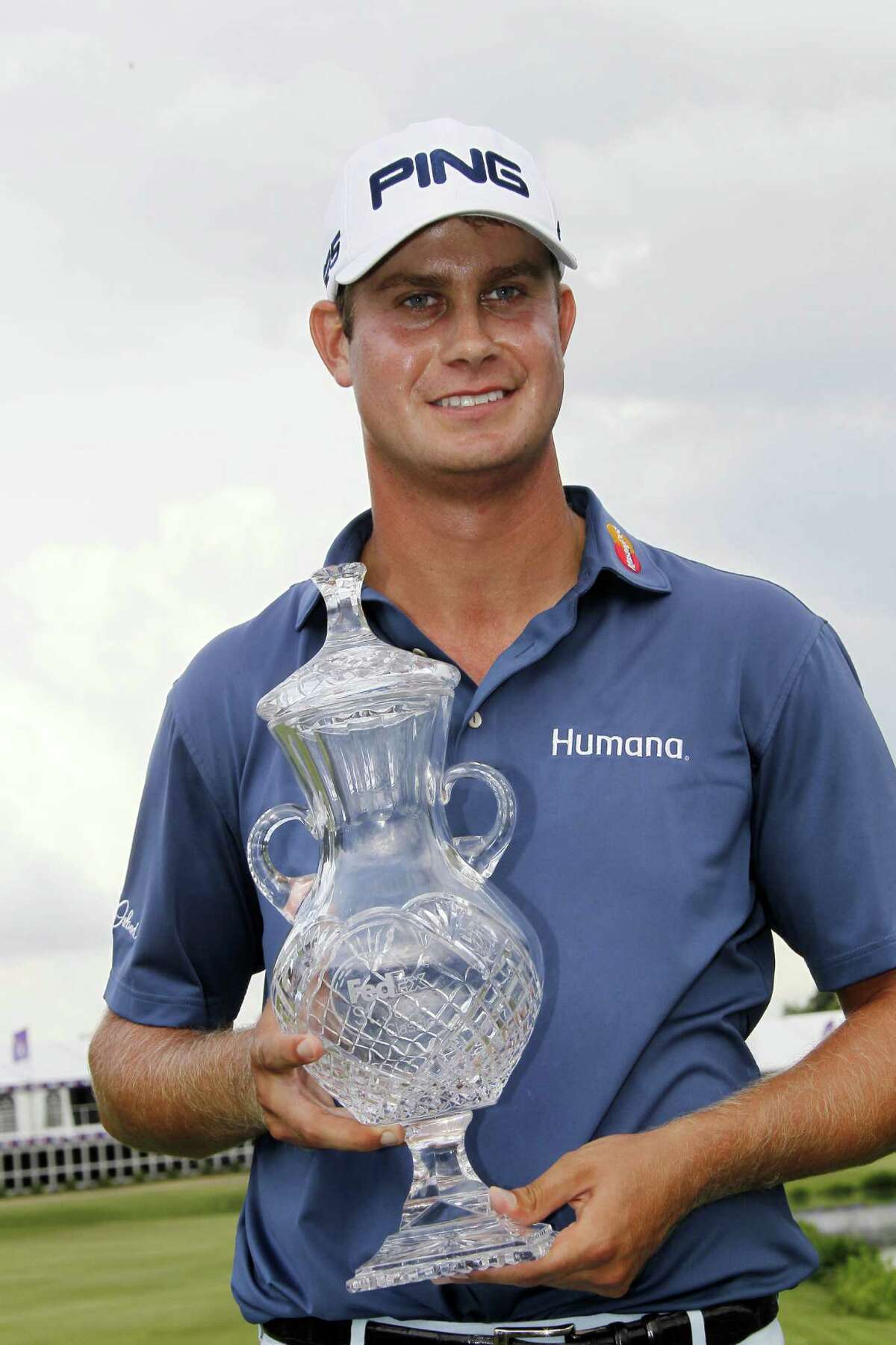 Late birdies lift English to first PGA win