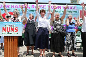 A group of nuns affiliated with National Catholic Social Justice perform a chant during a rally for immigration reform at St. Leonard Parish, Sunday, June 9, 2013. The group is with the NETWORK Nuns on the Bus campaign touring the country pushing for comprehensive immigration reforms.