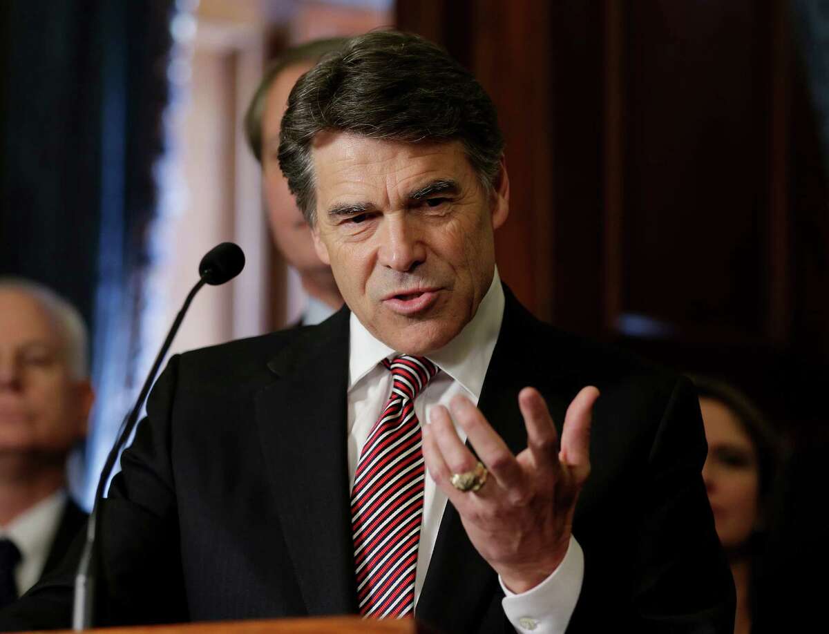 FILE - In this May 28, 2013 file photo, Gov. Rick Perry speaks during a ceremonial signing of a water fund bill, in Austin, Texas. Perry plans to announce any day if he will seek re-election next year. But that decision could depend as much on whether he wants to run for president again in 2016 as it does his desire to stay in the governor’s mansion. (AP Photo/Eric Gay, File)