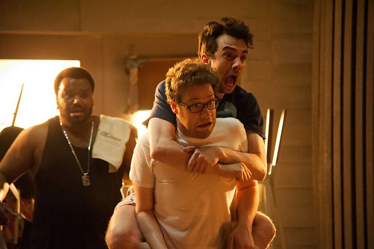 L-r, Craig Robinson, Seth Rogen and Jay Baruchel in Columbia Pictures' "This Is the End".