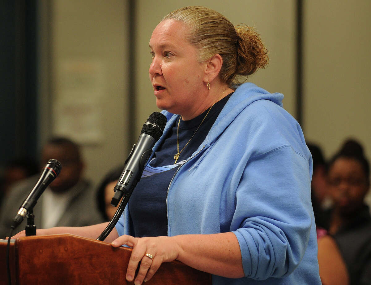 Marylee Taylor, P.A.C. president at Black Rock Elementary School, speaks against the layoffs of Parent Center coordinator Lisa Pavlich and facilitator Dolores Mason at the Board of Education meeting at the Aquaculture School in Bridgeport, Conn. on Monday, June 10, 2013.