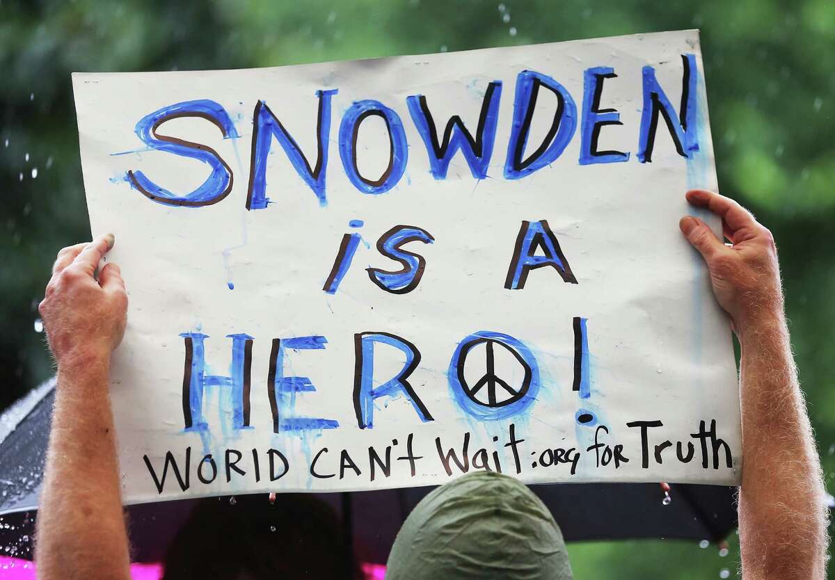 Edward Snowden is supported Monday at a small rally in New York City. The whereabouts of the admitted NSA whistle-blower is unknown.
