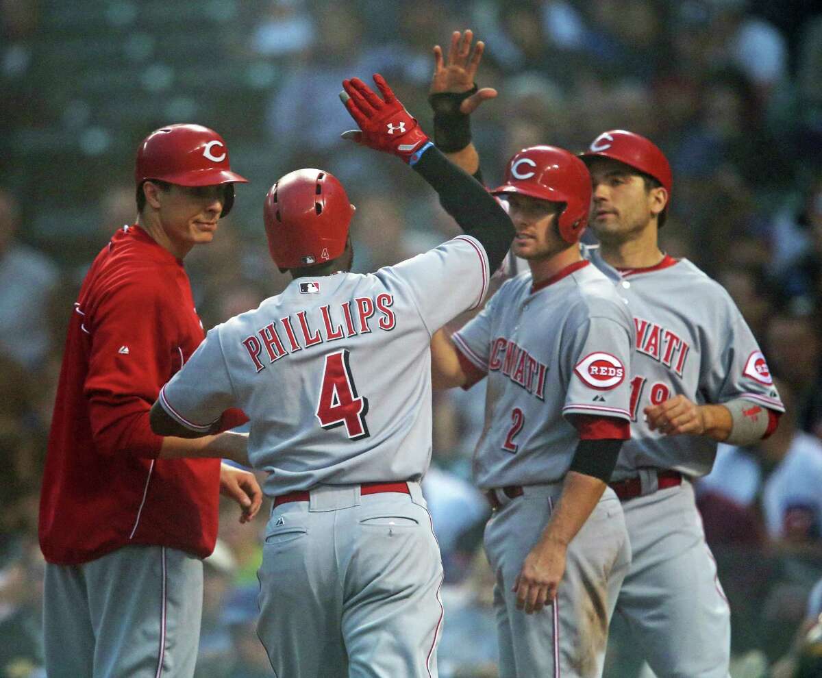 Brandon Phillips' grand slam and six RBIs give Reds victory over Cubs, MLB