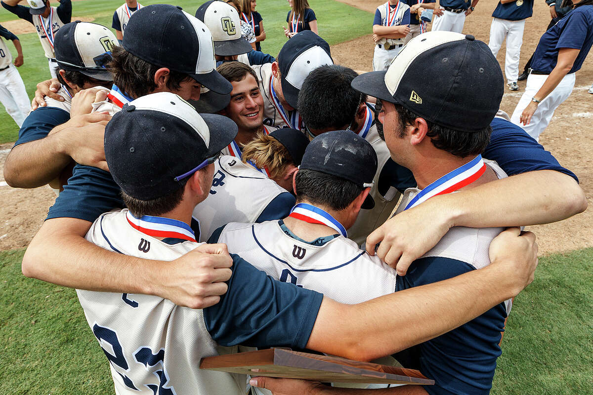 O'Connor seniors embrace with their runner-up plaque following their Class 5A state semifinal game with Conroe The Woodlands at Dell Diamond in Round Rock on Friday, June 7, 2013. O'Connor lost the game 2-1 to the Highlanders. MARVIN PFEIFFER/ mpfeiffer@express-news.net