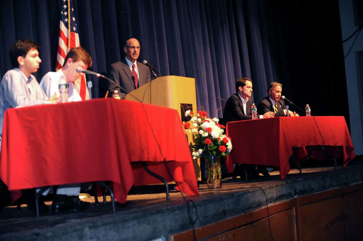 Nick Debany, Young Republicans, senior; Nick Abbott, Young Democrats, junior; Chris Winters, Headmaster; and Rep. Jims Himes, D-Greenwich; and Fred Camillo, State Rep., in a discussion on gun control in the auditorium, at Greenwich High School, in Greenwich, Tuesday, June 6, 2013.