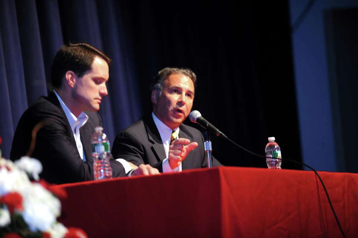 Rep.Jim Himes D-Greenwich, and State Representative Fred Camillo speak at the discussion on gun control in the auditorium, at Greenwich High School, in Greenwich, Tuesday, June 6, 2013.