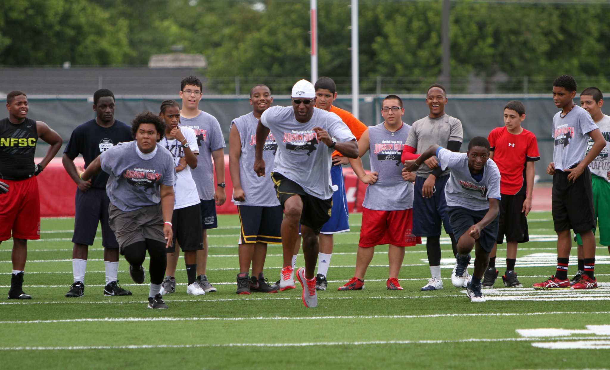 Pros Give Tips To Youngsters During Judson Football Camp