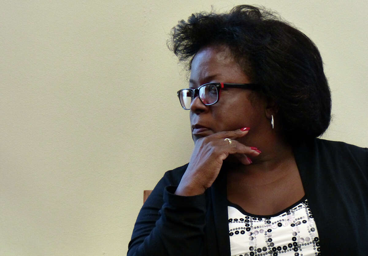 School principal Carmen Perez Dickson attends a Bridgeport Board of Education disciplinary hearing against her at Bridgeport City Hall in Bridgeport, Conn. on Tuesday June 11, 2013.