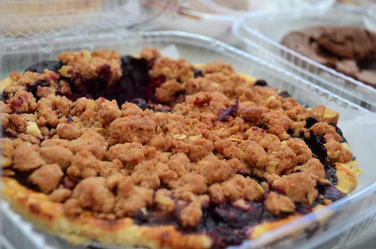 The raspberry rhubarb pie from the Whistle Stop Bakery was just one of many pies available to sample at the Darien Farmer's Market on June 12.