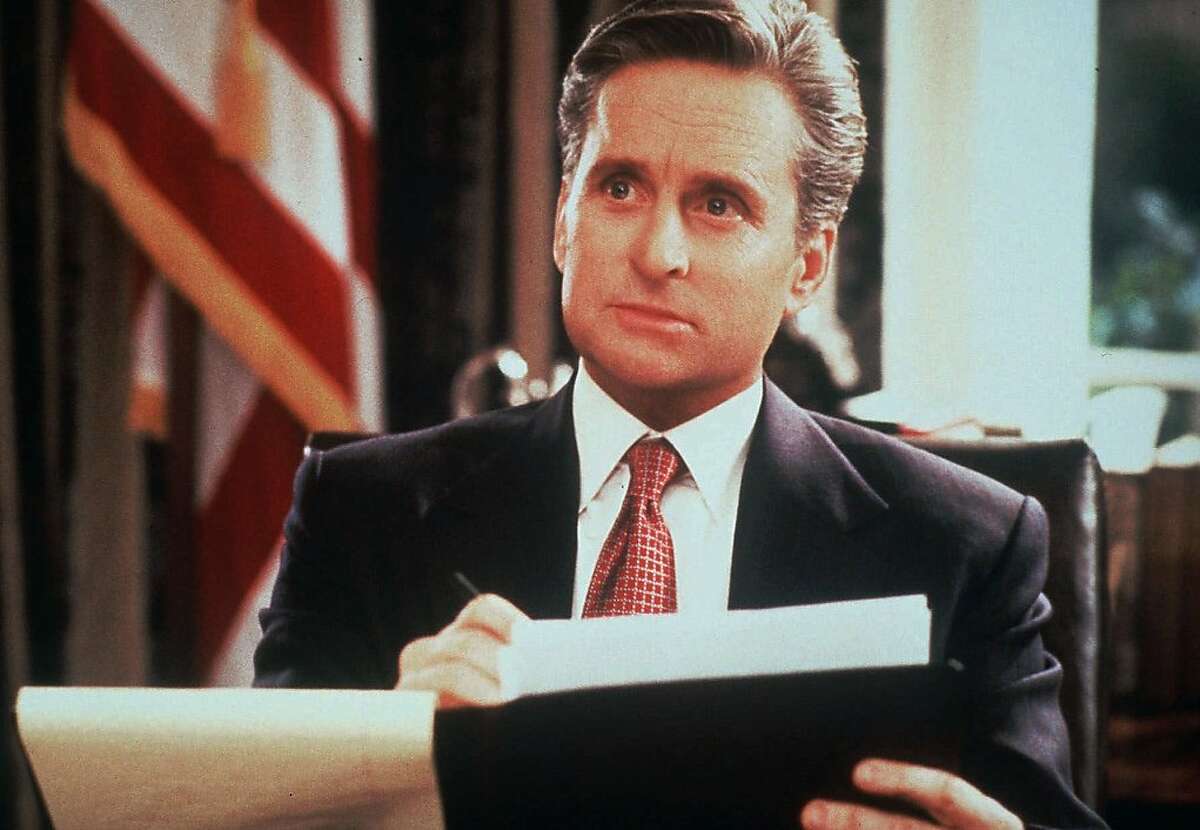 FILE--Michael Douglas, shown in this undated file photo, stared as the widowed president Andrew Shepherd in the 1995 film "The American President." Life in the White House has been a hot topic for films during the Bill Clinton years. (AP Photo/Castle Rock Entertainment)