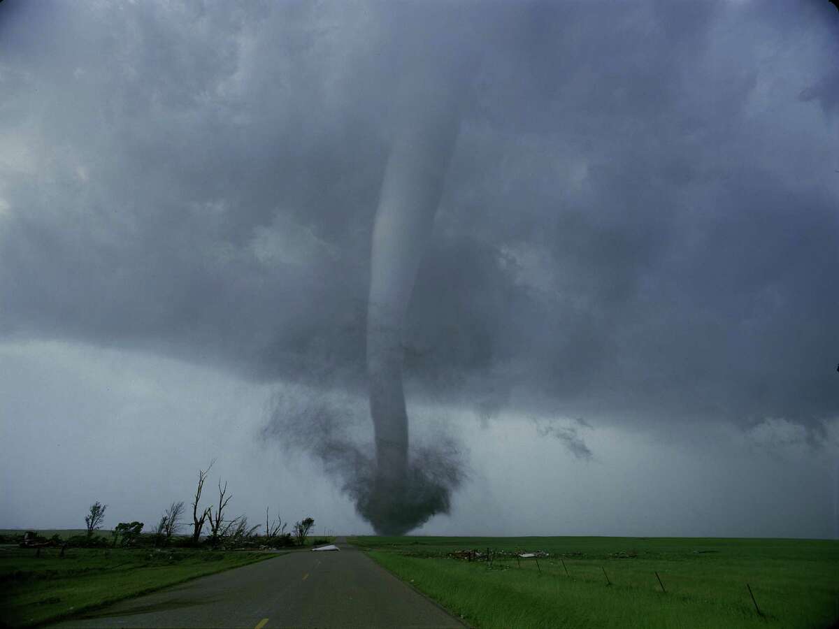 Tornado chasers' truck shoots Imax from inside storms (photos) - CNET