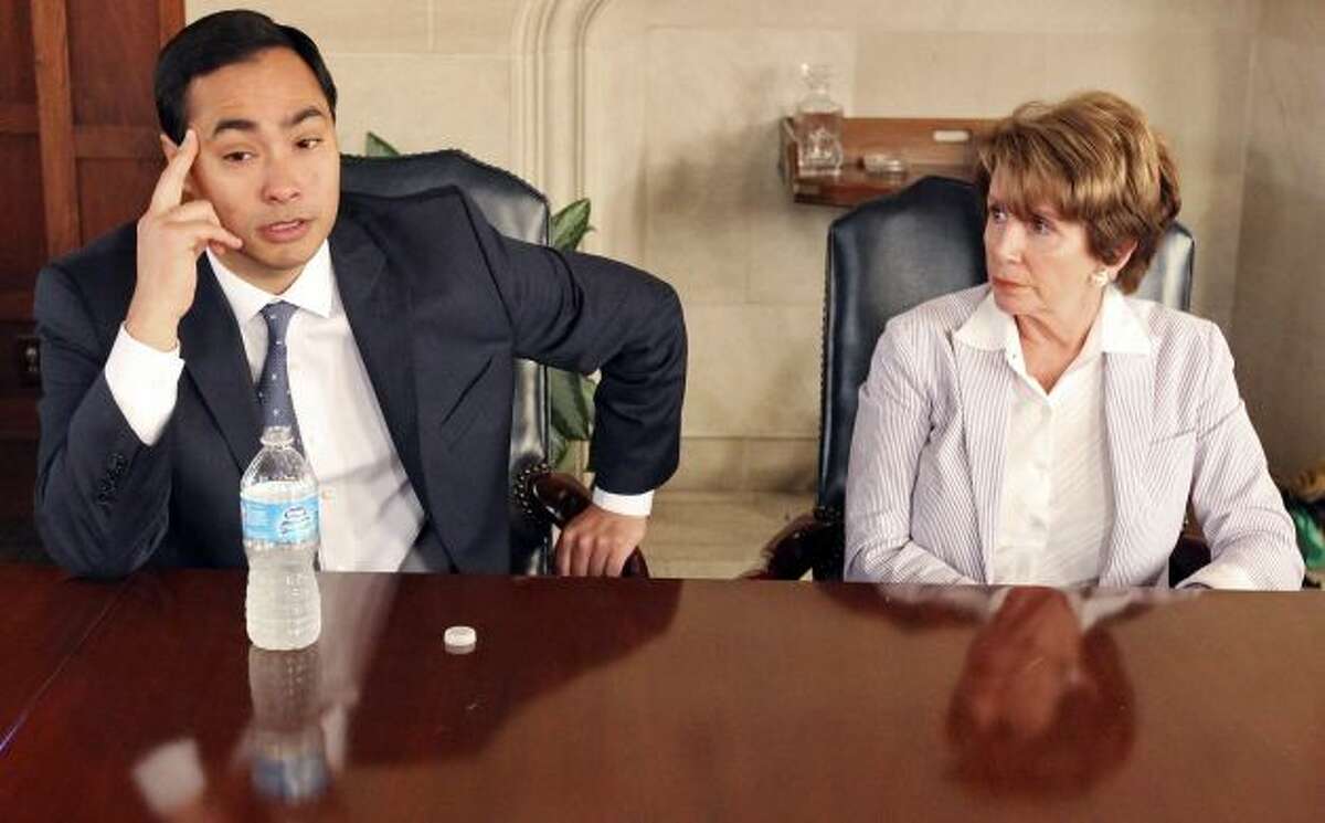 Rep. Joaquin Castro (left) speaks as House Minority Leader Nancy Pelosi listens Saturday Feb. 23, 2013 during a meeting with the San Antoino Express-News Editorial Board at the San Antoino Express-News. Photo: Edward A. Ornelas, San Antonio Express-News