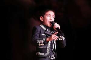 Young mariachi sings anthem again