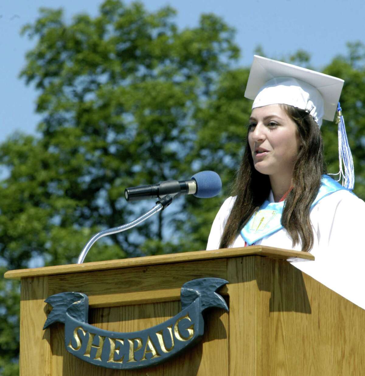 Class of 2013 president Emily Deanne offers her valedictory address to the 500 or so people on hand Saturday during Shepaug Valley High School's commencement ceremony on the school campus in Washington. June 15, 2013