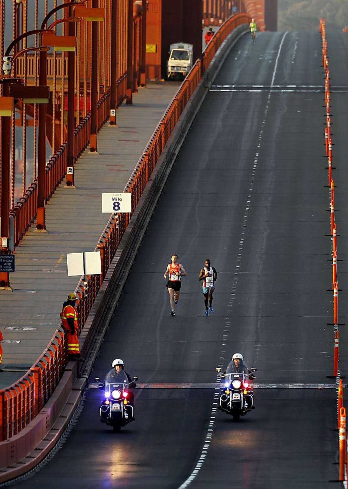 At mile eight, eventual marathon winner Francois Lhuissier (left) and second place finisher Ismail Ssenyange had the Golden Gate Bridge to themselves Sunday June 16, 2013. Thousands ran in the annual San Francisco Marathon, which was held earlier this year to accommodate the America's Cup races.