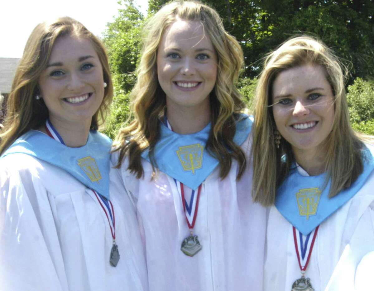 Happily posing for a friend's camera after Shepaug Valley High School's commencement ceremony for the Class of 2013 are sisters, from the left, Hannah, Emma and Mia Landegren. June 15, 2013