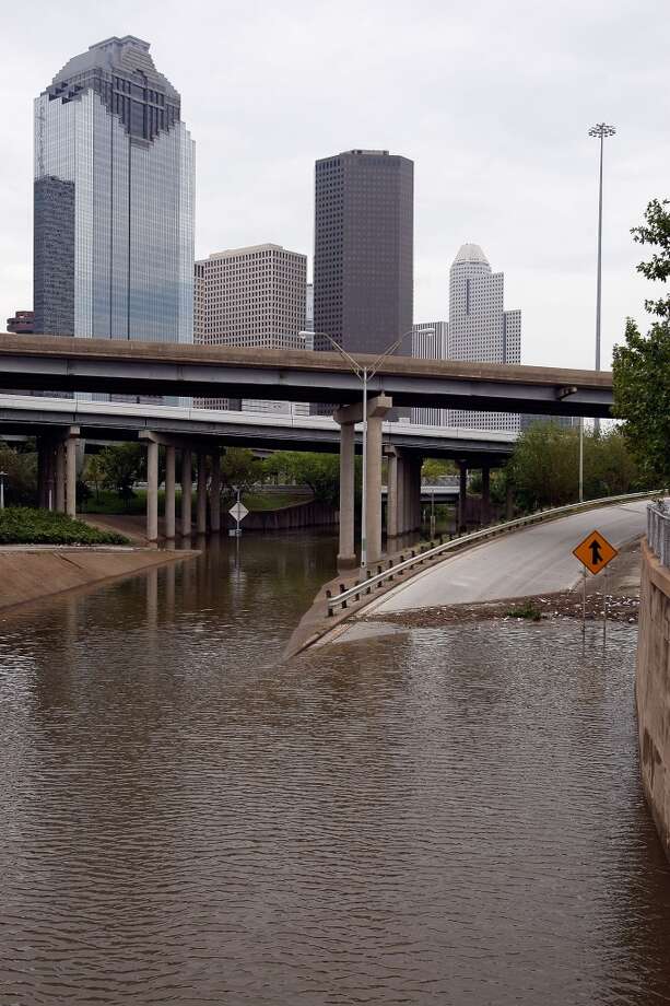 HOUSTON - SEPTEMBER 14: A few low lying areas surrounding Downtown Houston are still flooded from Hurricane Ike September 14, 2008 in Houston, Texas. Ike caused extensive damage along the Texas Gold Coast, leaving millions without power. (Photo by Chris Graythen/Getty Images)