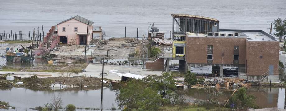 SEABROOK, TX - SEPTEMBER 14: The commerical zone of the waterfront sits damaged September 14, 2008 in Seabrook, Texas. Hurricane Ike made landfall yesterday morning at Galveston causing widespread wind and flood damage along the Texas and Louisiana coasts. San Leon is located on Galveston Bay. (Photo by Dave Einsel/Getty Images)