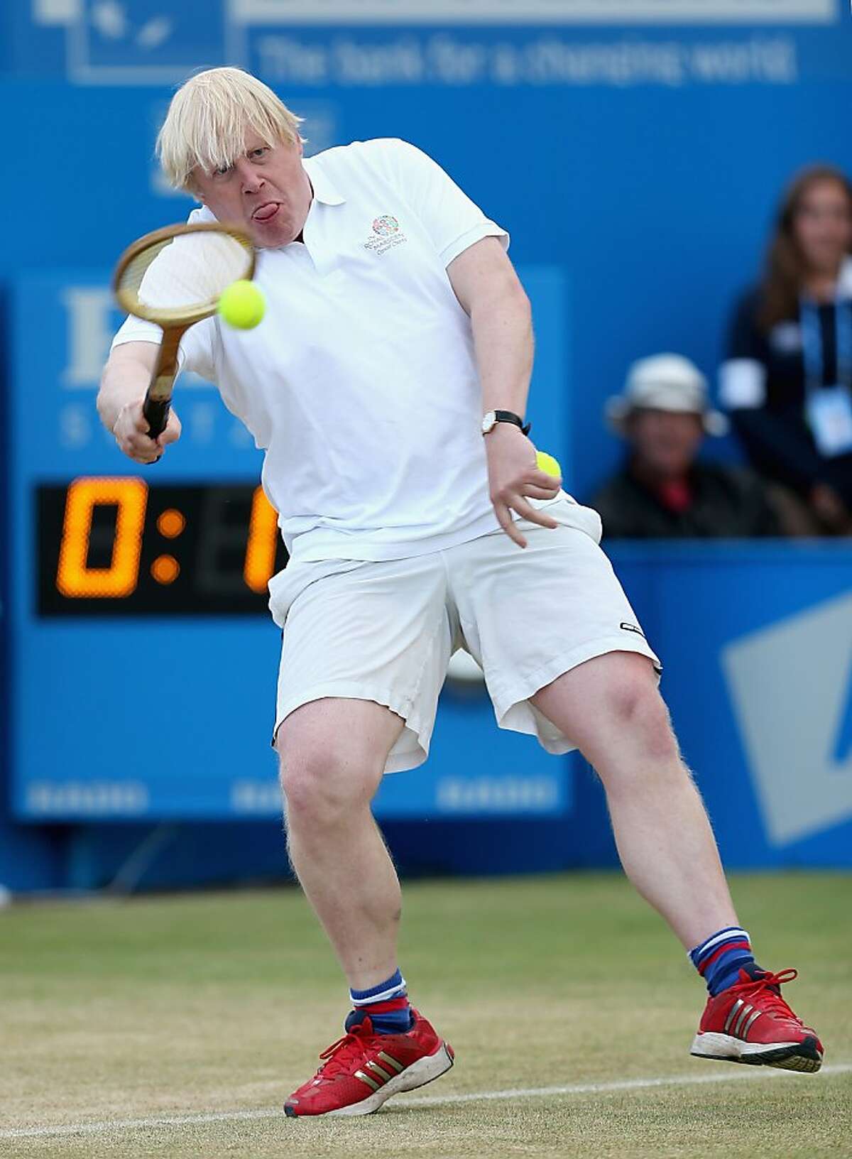 Even if you're the mayor of one of the world's greatest cities (London), you probably shouldn't step on the court if you play tennis like this. (Mayor Boris Johnson during a charity match at the AEGON Championships in London.)