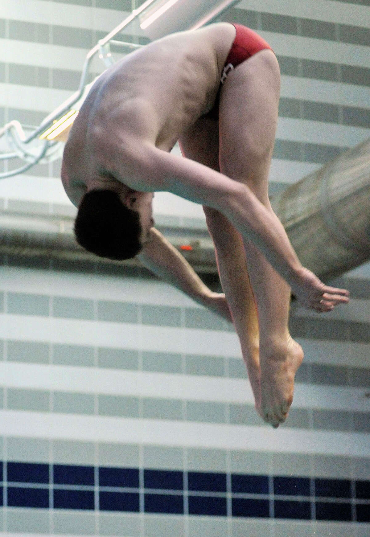 Fairfield Prep's Jake Bowtell competes in the state open diving finals at Middletown High School on Thursday, March14, 2013.