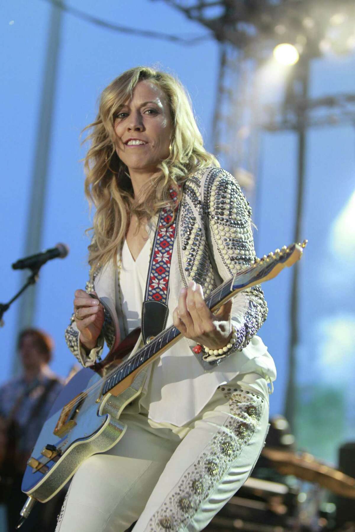 Sheryl Crow's new country album, “Feels Like Home,” was produced in Nashville, where she now lives.