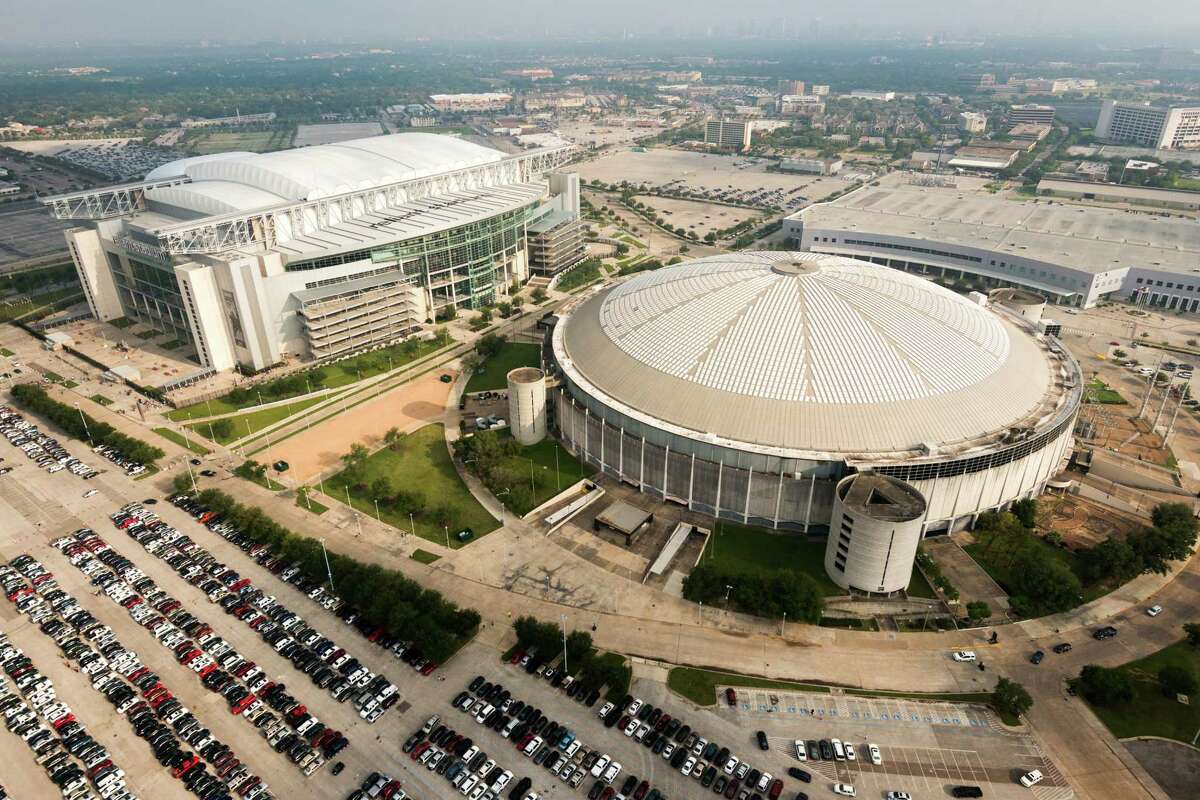 Reliant Stadium and the Reliant Astrodome are seen in an aerial view on Saturday, May 18, 2013, in Houston.