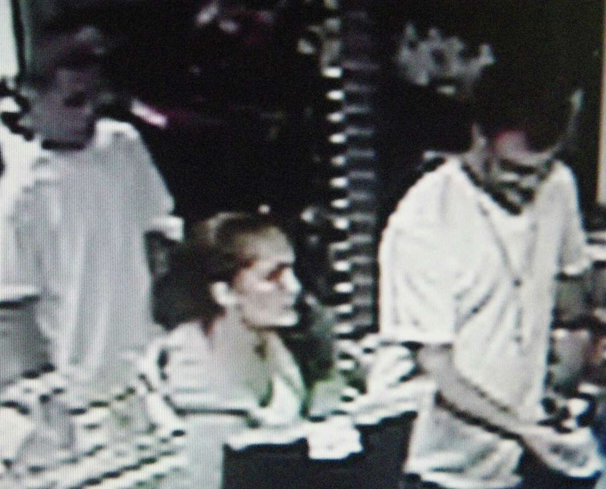 Police released video surveillance images of the four two men and two women suspected of holding a man hostage early Wednesday during a ride while they demanded he turn over the PINs for his debit cards.