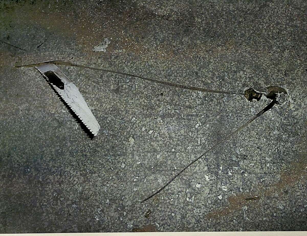 A photograph provided by the District Attorney's office shows a saw, allegedly wielded by the Macys, cutting through the floor of a tenant's apartment. San Francisco District Attorney George Gascon announced that Kip and Nicole Macy, the so-called 'landlords from hell,' have pleaded guilty to several felony counts that will put them in prison for more than four years for trying to evict tenants from their South of Market building.