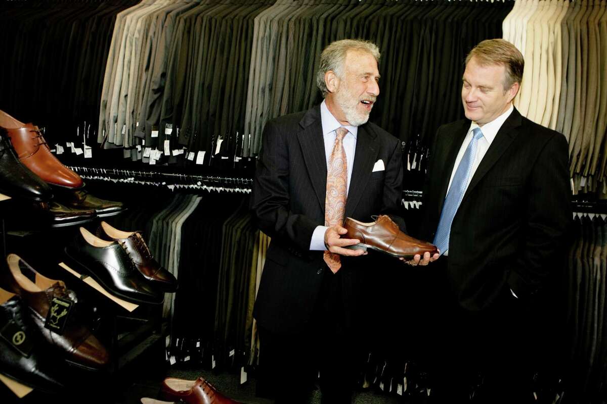 Men's Wearhouse sends founder Zimmer packing