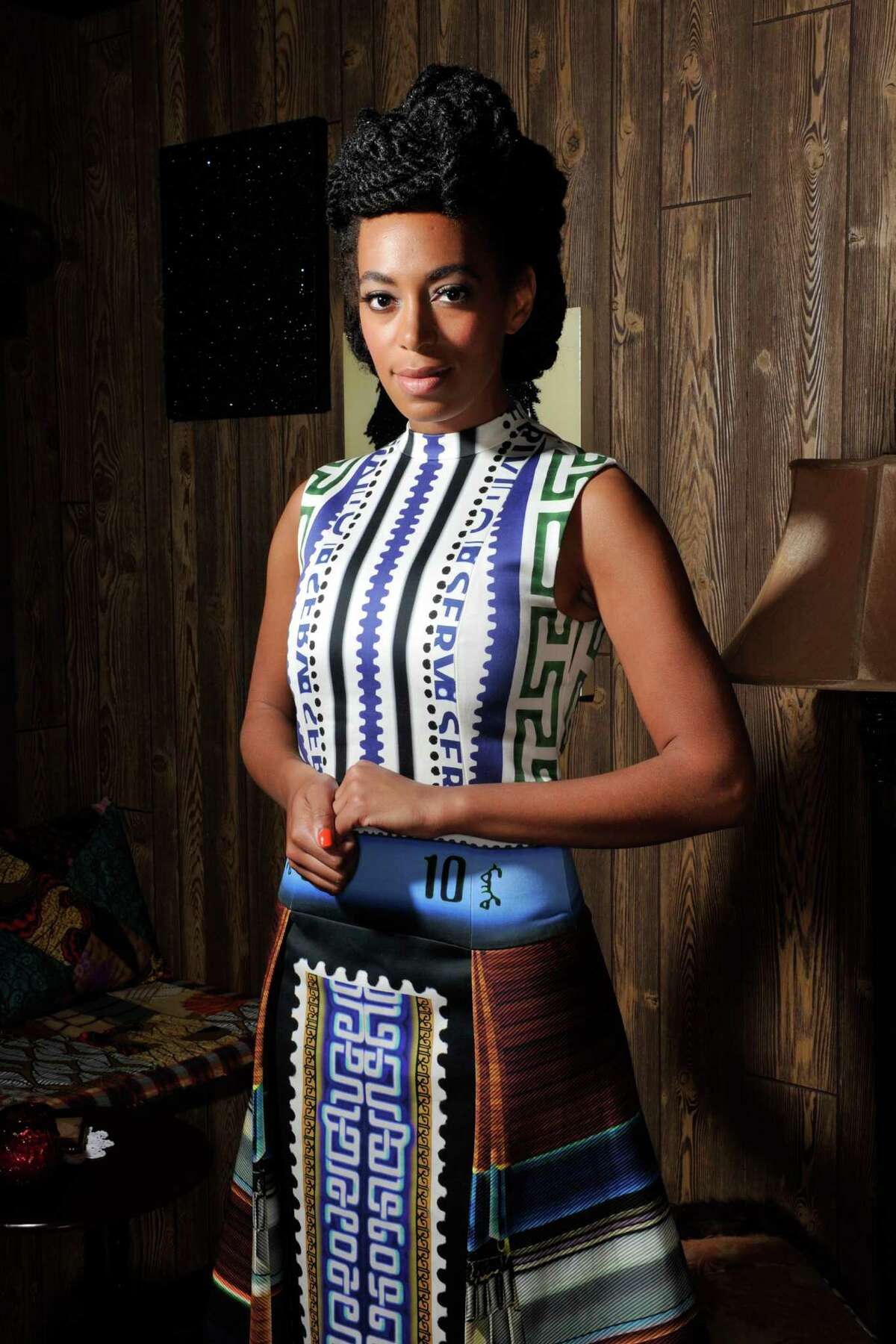 BASEL, SWITZERLAND - JUNE 12: Solange Knowles wearing Mary Katrantzou poses at 'Better Days', an art bar installation by Mickalene Thomas presented by Absolut Art Bureau at Art Basel on June 12, 2013 in Basel, Switzerland. (Photo by The Image Gate/Getty Images)
