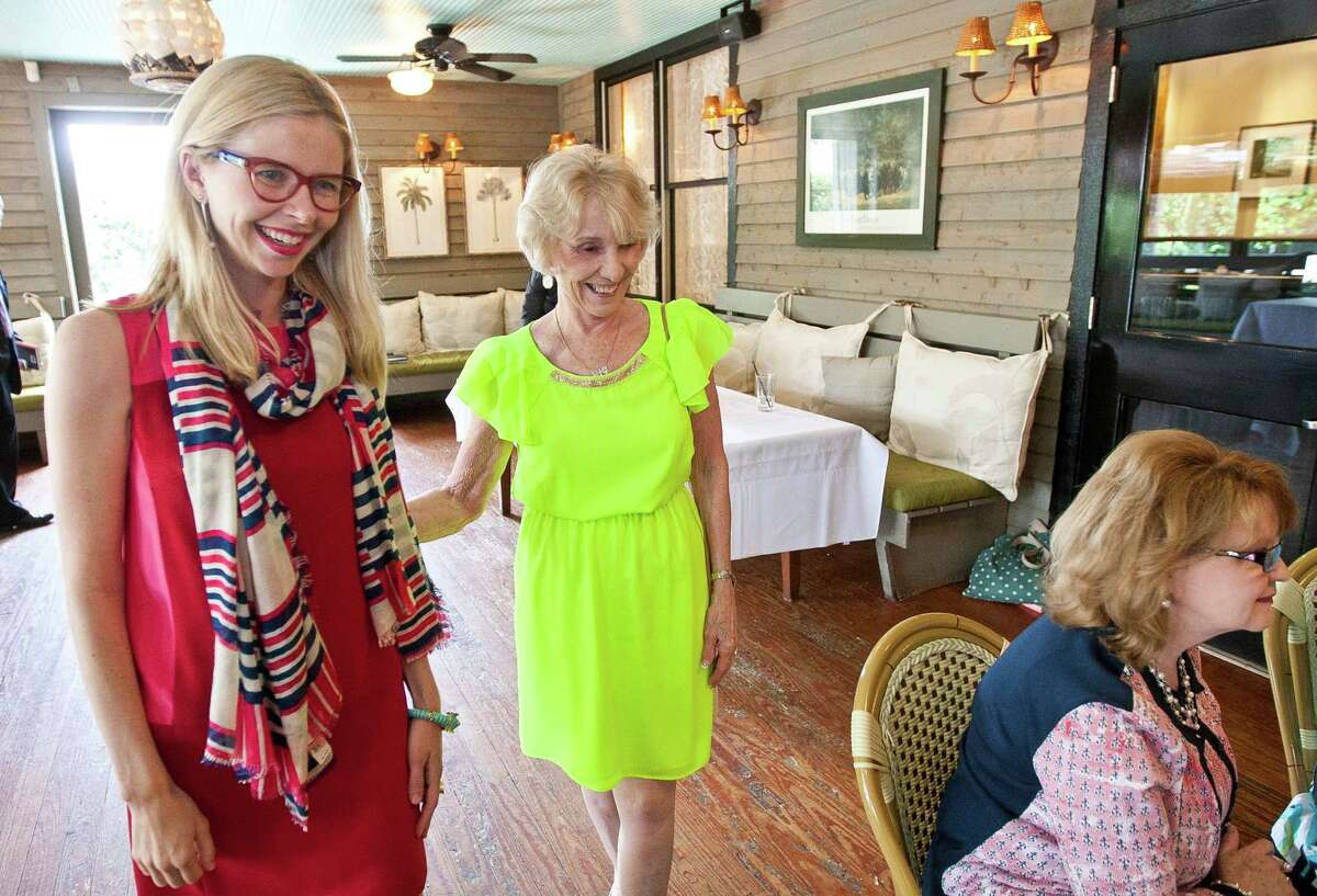 Lily Koppel, left, author of "The Astronaut Wives Club," and Sue Bean were part of a gathering last week at Ouisie's Table for a book-signing/reunion/tea party of wives of former astronauts.