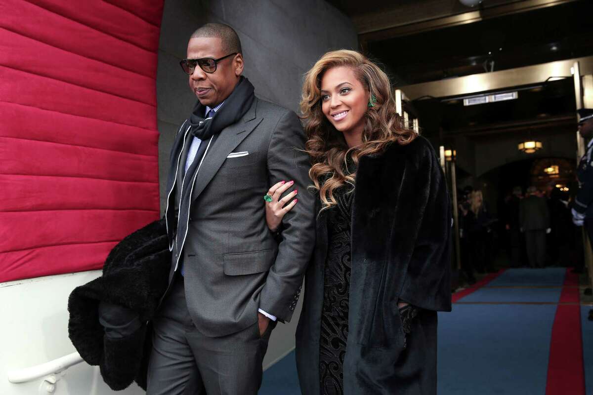 FILE - This Jan. 21, 2013 file photo shows recording artists Jay-Z and Beyonce at the Capitol in Washington for the Presidential Barack Obama's ceremonial swearing-in ceremony during the 57th Presidential Inauguration. The couple named their daughter, born Jan. 7, 2012, Ivy Blue. (AP Photo/Win McNamee, Pool, file)