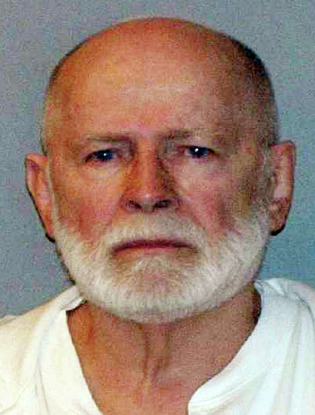 FILE - This June 23, 2011 booking photo provided by the U.S. Marshals Service shows James "Whitey" Bulger, captured in Santa Monica, Calif., after 16 years on the run. Bulger's trial began Wednesday, June 12, 2013 in federal court in Boston, where he is charged with playing a role in 19 killings during the '70s and '80s while allegedly the boss of the Winter Hill Gang. (AP Photo/ U.S. Marshals Service, File)