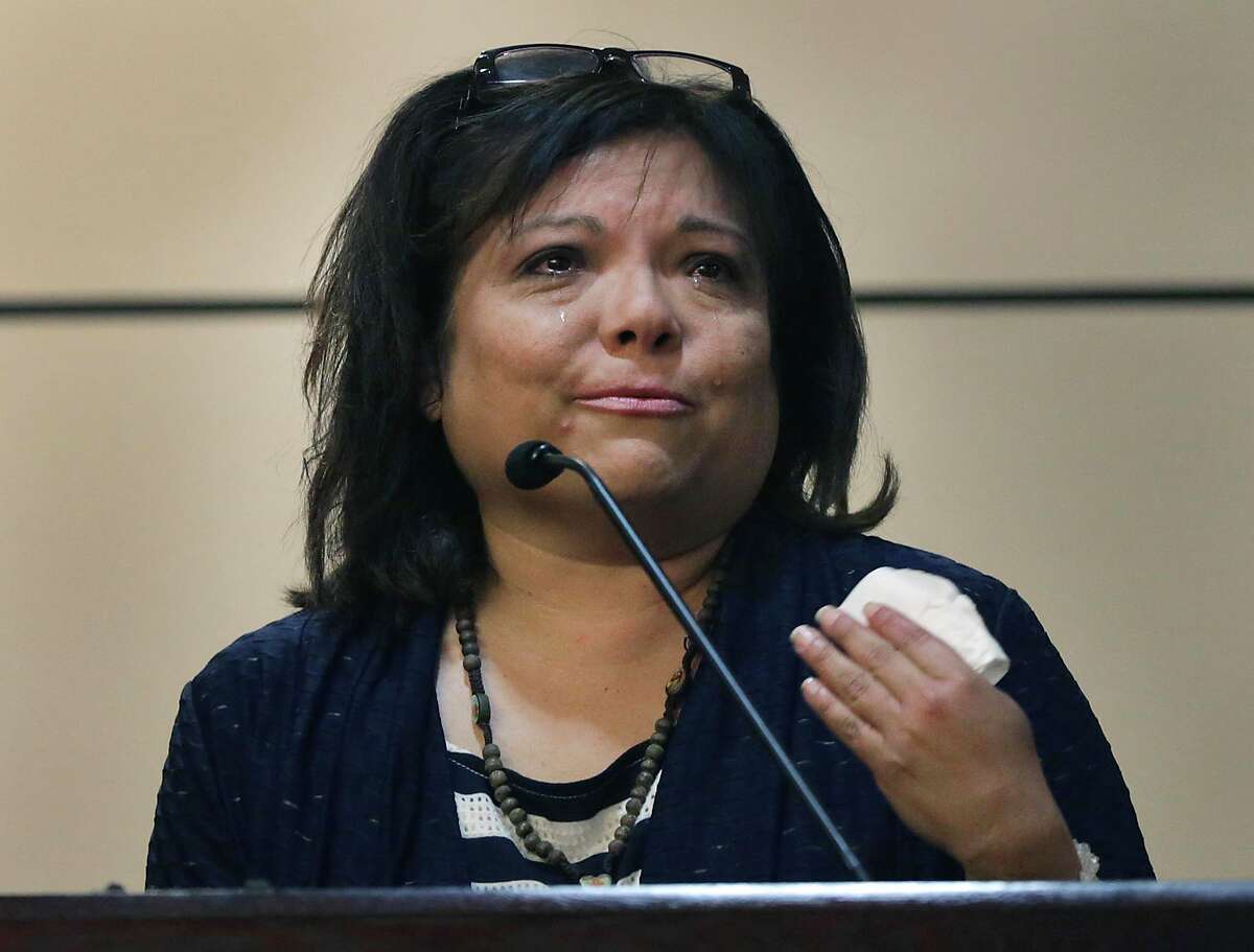 Former kindergarten teacher Cynthia Ambrose cries as she takes the witness stand in her own defense Thursday, June 20, 2013 in San Antonio. Ambrose, former San Antonio teacher accused of directing students to hit a schoolmate for being a bully has been convicted of official oppression. (AP Photo/San Antonio Express-News, Bob Owen) RUMBO DE SAN ANTONIO OUT; MAGS OUT; NO SALES; TV OUT; MANDATORY CREDIT