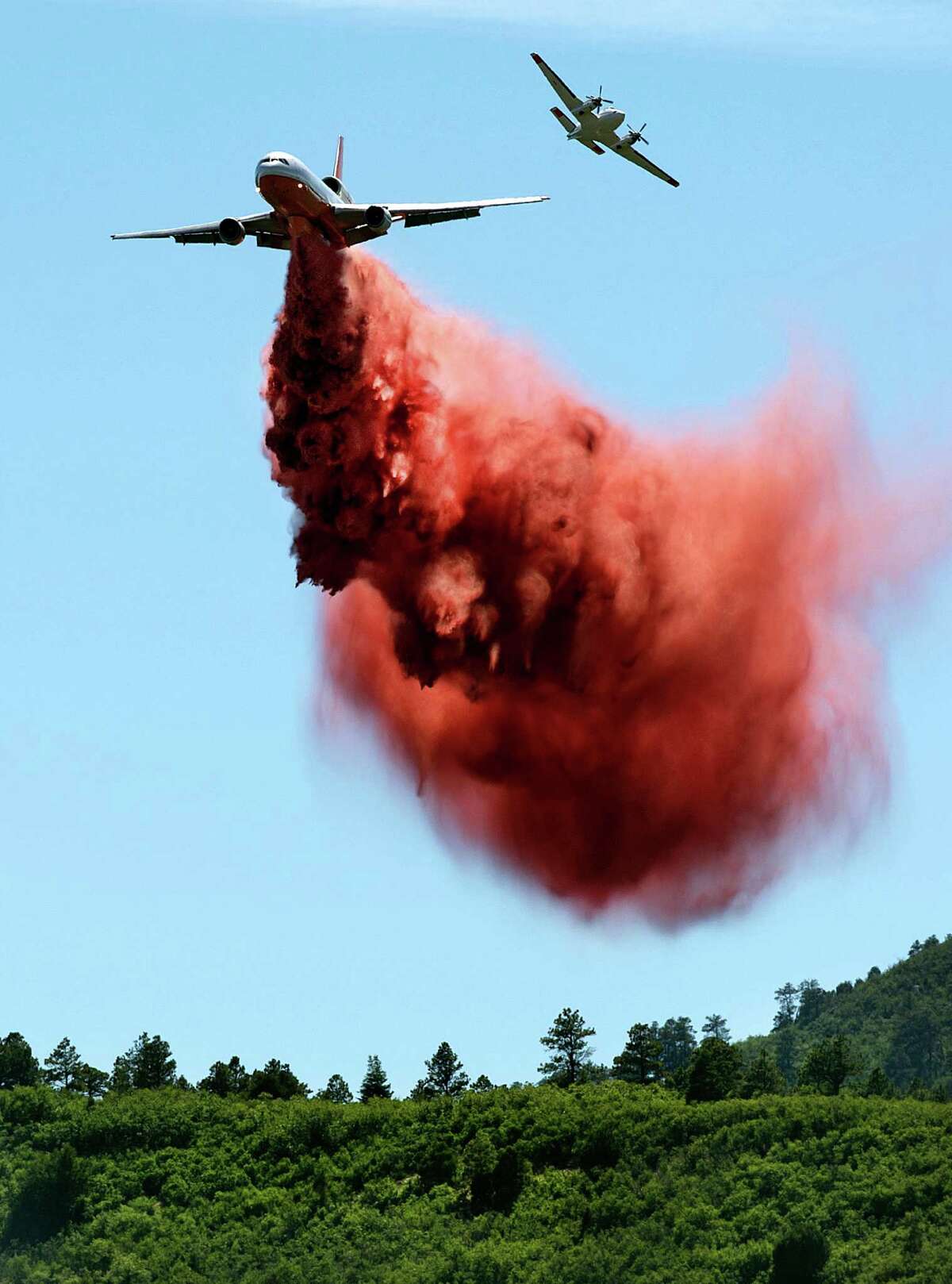 Air Tanker Drops Fire Retardant Over LA Hillside Blaze