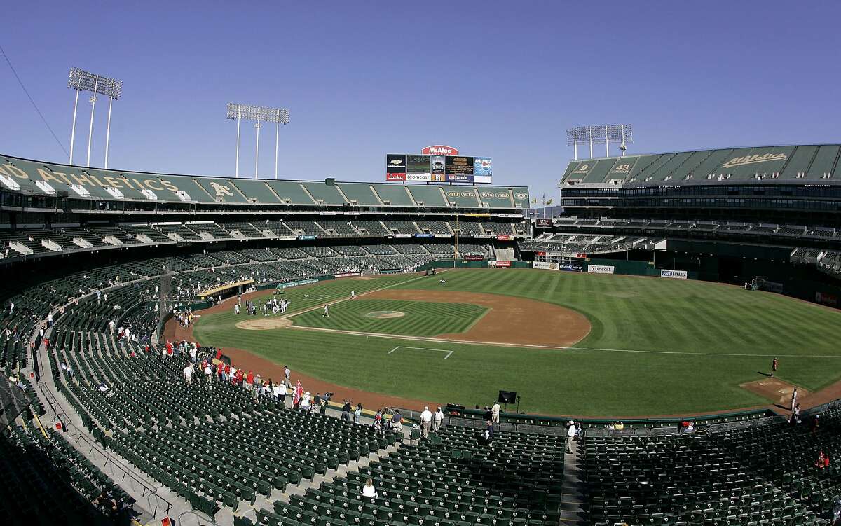 FILE - This Sept. 30, 2007 file photo shows O.Co Coliseum, then called McAfee Coliseum, home of the Oakland Athletics baseball team, in Oakland, Calif. Major League Baseball is dragging its feet on having team owners vote on the Athletics' proposed move to a new ballpark 40 miles south in San Jose, San Jose city officials said in a lawsuit filed Tuesday, June 18, 2013. The lawsuit — filed in federal court in San Jose — is disputing MLB's exemption to federal antitrust law, which MLB has used as a "guise" to control the location of teams, according to the suit. (AP Photo/Eric Risberg, File)