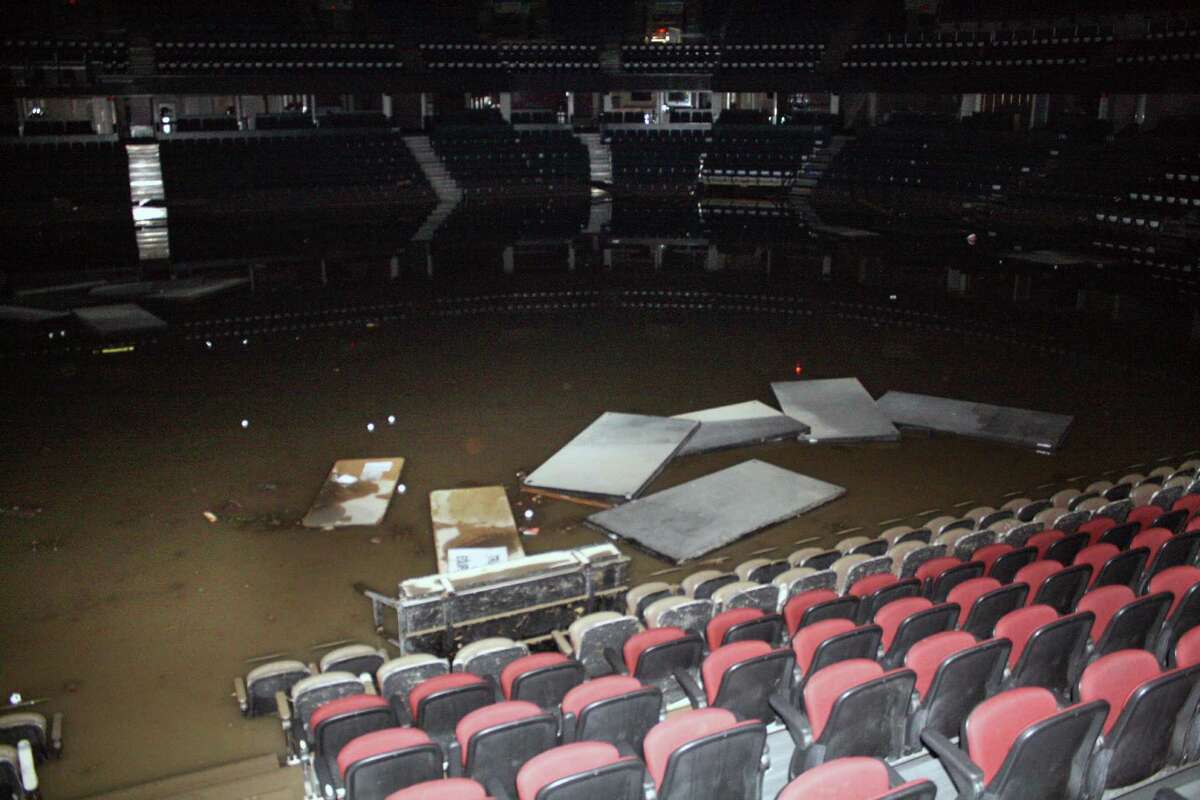 This undated photo provided by the Calgary Flames shows the inside of the Calgary Saddledome, in Calgary, Alberta. The Saddledome, home to the National Hockey League's Calgary Flames, was flooded up to the 10th row, leaving the dressing rooms submerged. The two rivers that converge on the western Canadian city of Calgary are receding Saturday, June 22, 2013 after floods devastated much of southern Alberta province, causing at least three deaths and forcing thousands to evacuate. (AP Photo/Calgary Flames)