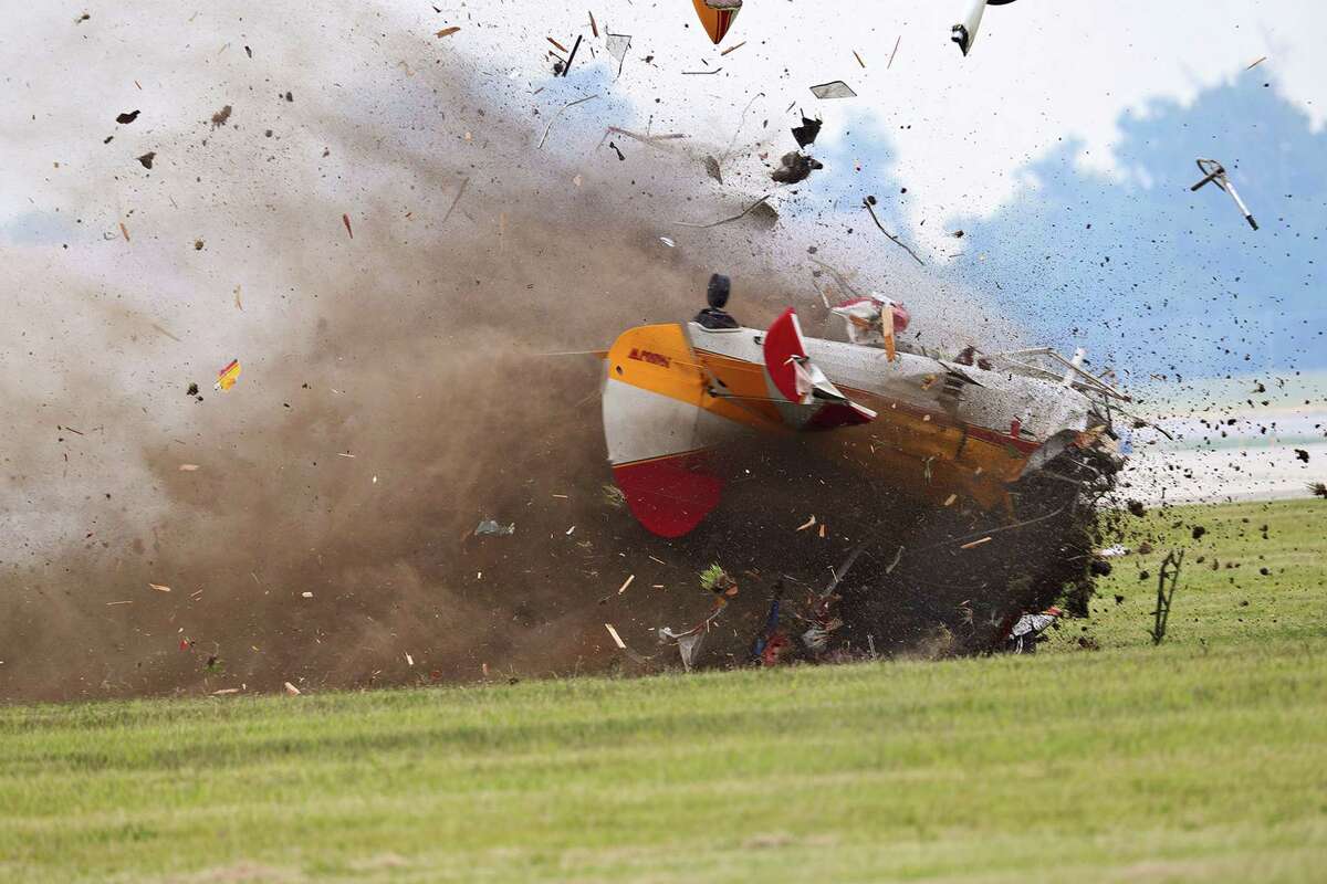 A stunt plane carrying a wing walker crashes during a performance at the Vectren Air Show near Dayton, Ohio. The crash killed the pilot and the wing walker.