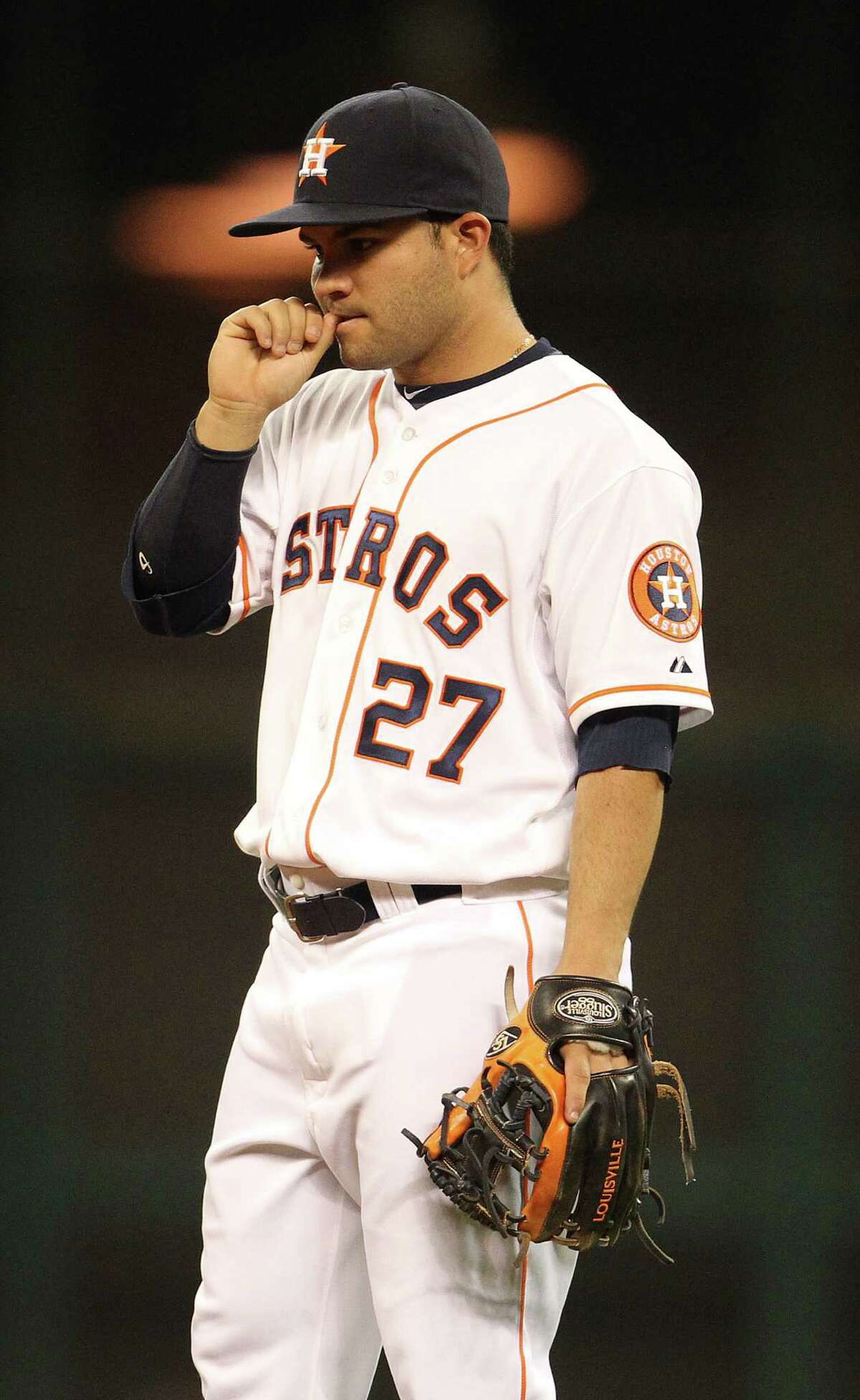 Jose Altuve tries to put aside his grieving while on the field.
