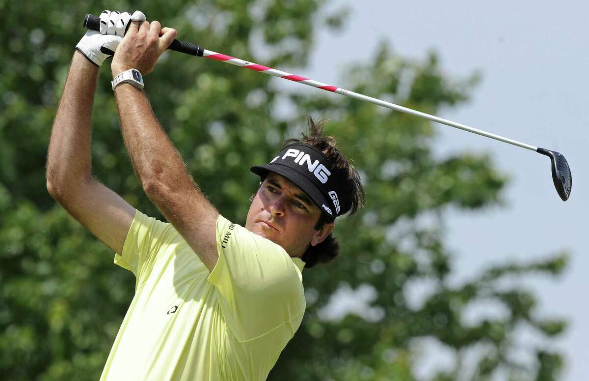 Bubba Watson, the 2012 Masters champion, watches his drive on the second hole during the third round of the Travelers Championship in Cromwell, Conn.