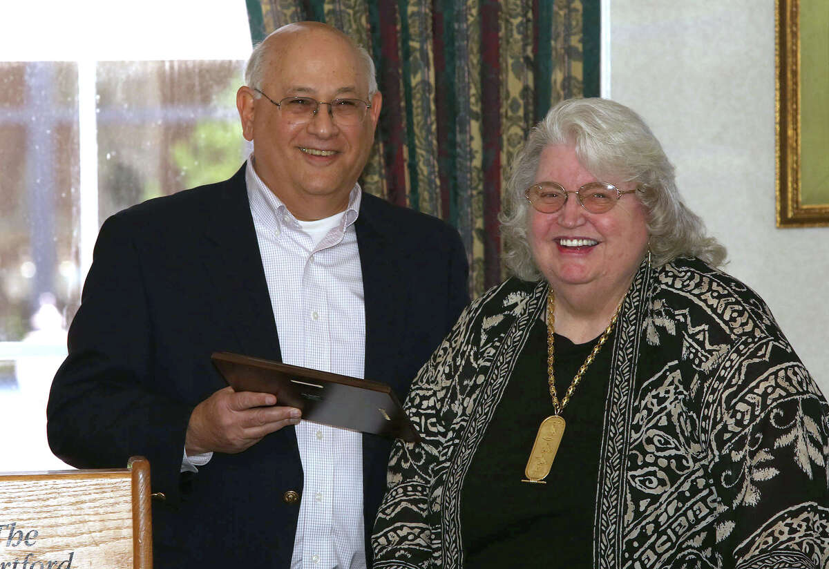 Former state Freedom of Information Commission member Norma Riess receives CCFOI's Champion of Open Government Award from CCFOI Executive Board member Mitchell Pearlman.